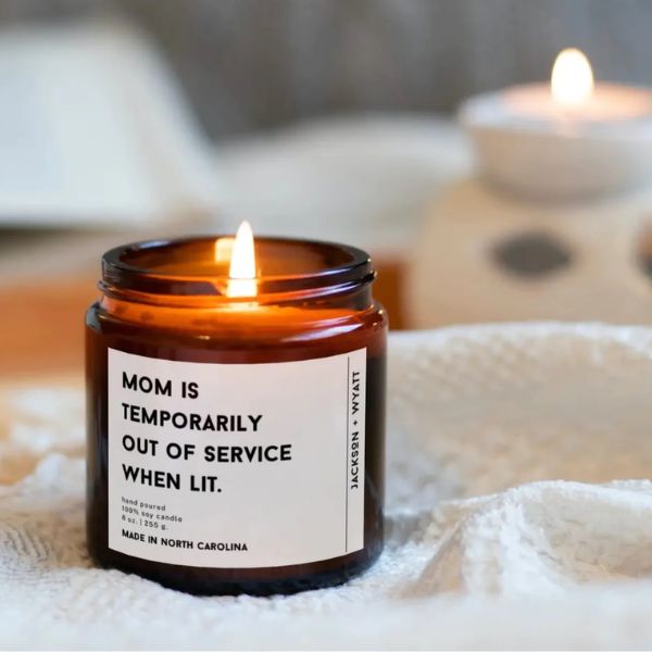 A whimsical and heartwarming "You're a Cool Mom" soy candle, perfect for gifting to your boyfriend's mom on special occasions, available in our curated selection of gifts for boyfriend's mom.