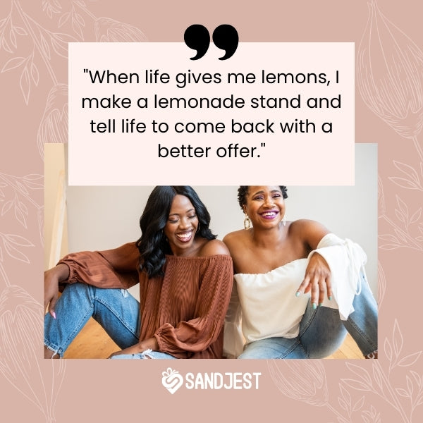 Two black women laughing together, exuding joy and humor.