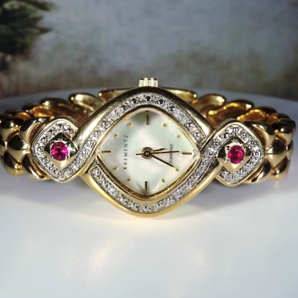 Genuine Rubies and Diamonds Women’s Wrist Watch, a timeless 40th wedding anniversary gift.