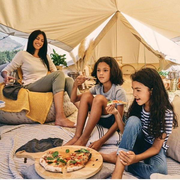 Glamping with friends offers a chic 50th birthday celebration amidst nature's beauty.
