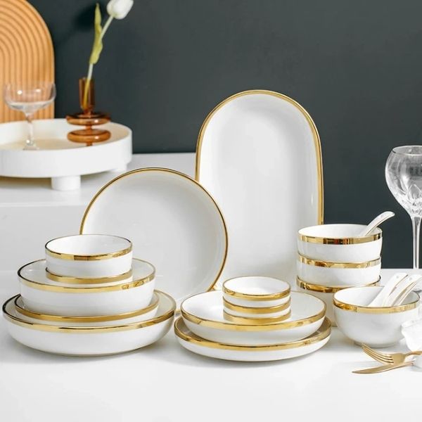 Dine in sophistication with the Gold-Trimmed Porcelain Dinnerware Set, a lavish Valentine's Day gift for her.