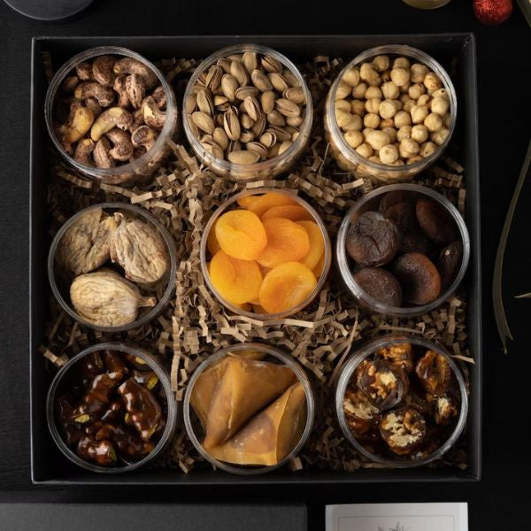 Indulge in the Gourmet Nuts and Snacks Basket, a flavorful and crunchy Mother's Day gift.