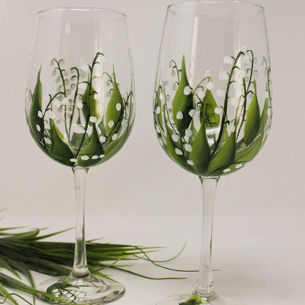 Sip from Hand-Painted Wine Glasses, a touch of artistic elegance.