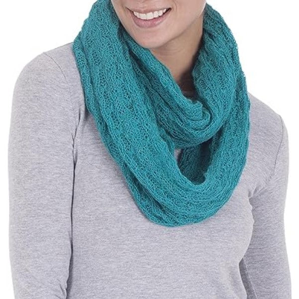 A handmade infinity scarf, a personalized DIY gift for mom, knitted with your love and care.