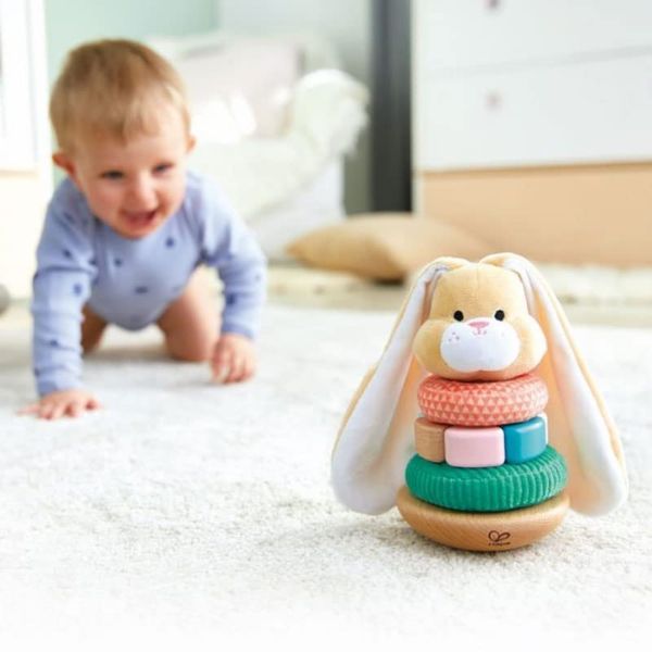 The Hape Floppy-Ear Bunny Stacker is an educational and adorable Easter gift for babies