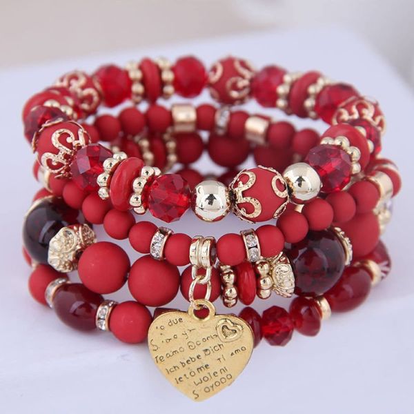 Adorn wrists with a Heart Beaded Bracelet as a symbol of love and accomplishment featured in our Graduation Gift Basket.