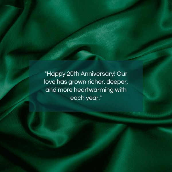"Happy 20th Anniversary! Our love has grown richer, deeper, and more heartwarming with each year." against a satin drape.