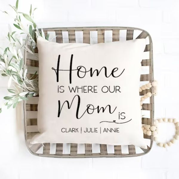 A personalized 'Home Is Where Our Mom Is' Pillow, a reminder of the special bond between a mother and her child.