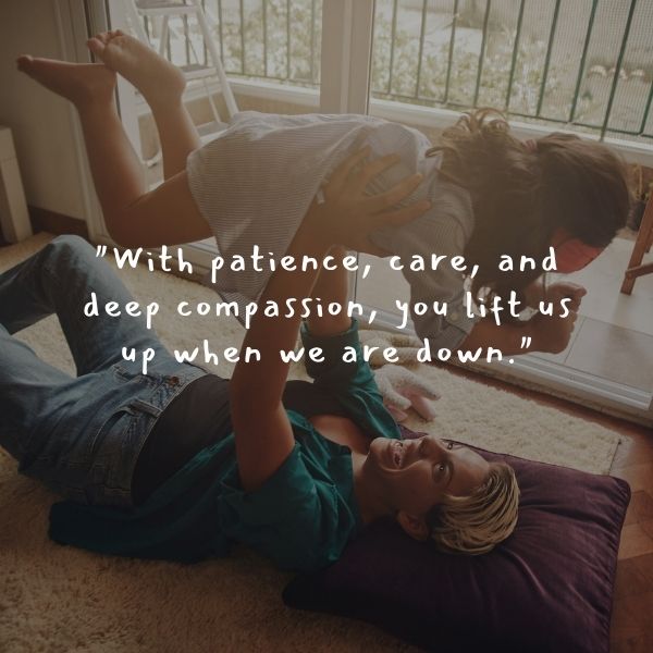 Father and child playing on the floor with an inspirational quote about paternal care and compassion.