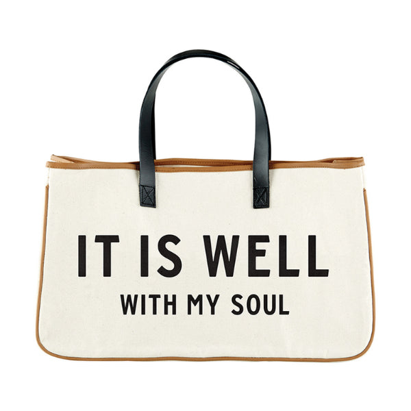 An "It Is Well" canvas tote ideal for moms to carry their essentials