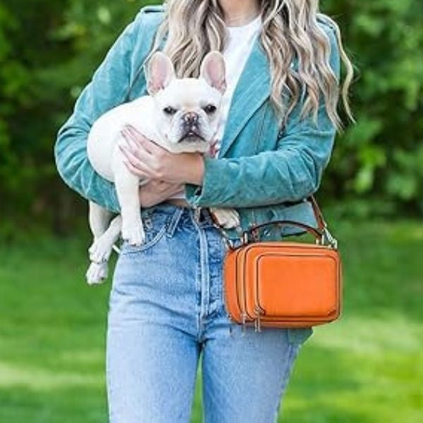 K. Carroll Accessories Kelsey Crossbody in Orange, a trendy and practical crossbody, is the perfect blend of fashion and convenience for your daughter-in-law.