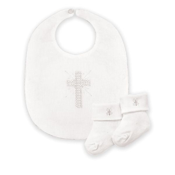 Personalized Keepsakes: A keepsake baptism bib with embroidered details.