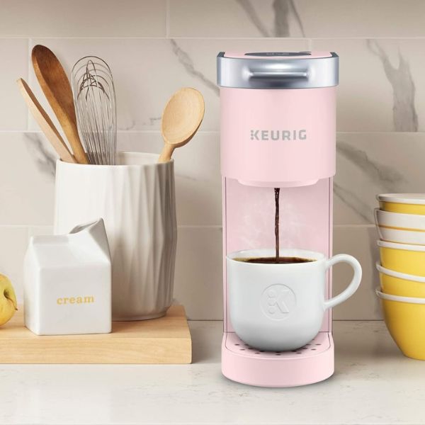 Start her mornings right with the Keurig K-Mini Single-Cup Coffee Maker as a compact and efficient graduation gift.