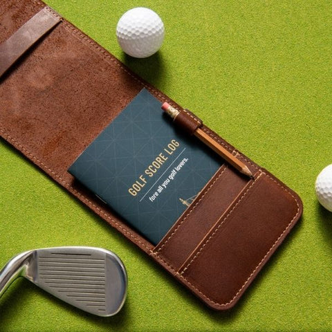 A sophisticated leather scorecard holder, an ideal addition to any golfer's gear for an organized and stylish round on the course.