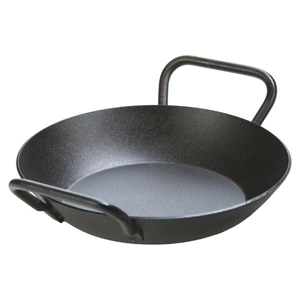 Lodge Manufacturing Company Carbon Steel Skillet, a durable and versatile cookware essential for architects.