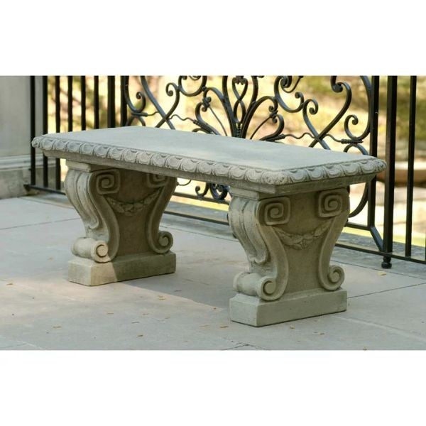 The Longwood Concrete Outdoor Bench adds elegance and comfort to your garden space.