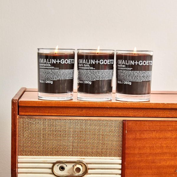 Elevate your mom's space with the warm glow and enchanting scents of luxury candles, a heartfelt gift from her son.