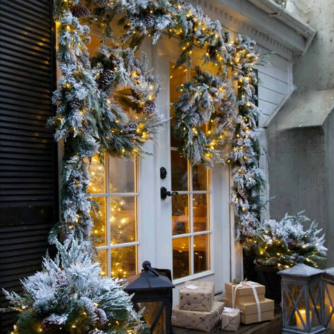 Elegant display of indoor and outdoor christmas light decorations, showcasing matching thematic colors and styles.
