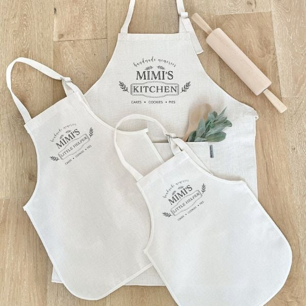 Adorable Matching Personalized Aprons for moms and kids, a fun Mother's Day gift that encourages bonding in the kitchen.