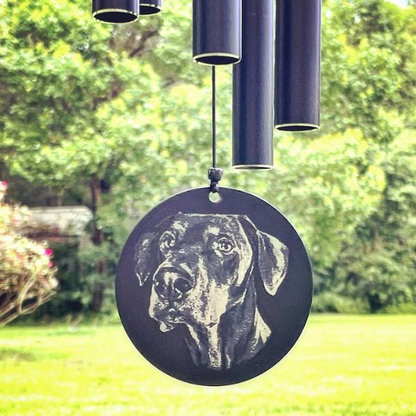 Personalized memorial wind chimes with a silhouette of a loyal dog.