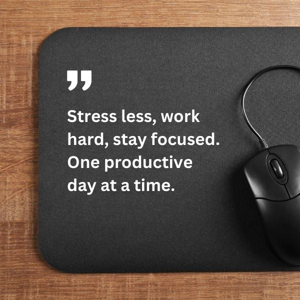Inspirational Monday quote on a mousepad, promoting stress reduction and focused work ethic