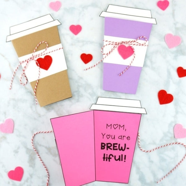 A mother's day card resembling a coffee cup, complete with string heart accents.