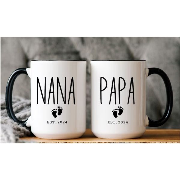 A matching set of 'NANA' and 'PAPA' mugs, a cute gift for grandparents to enjoy their morning beverages together.