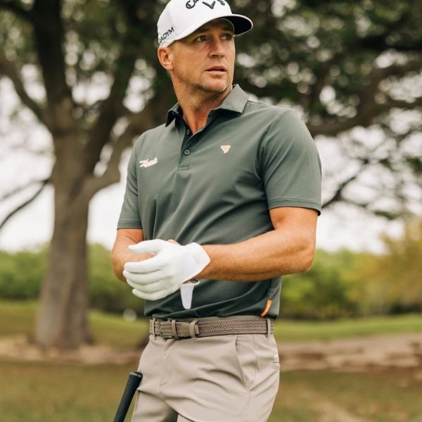 A stylish open collared shirt, the perfect addition to any golf-loving father's wardrobe that combines comfort and elegance for a day on the greens.