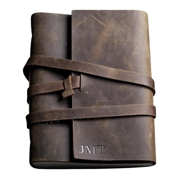 Ox & Pine Personalized Wrapped Leather Journal, a sophisticated and personalized graduation gift for him to document his journey.