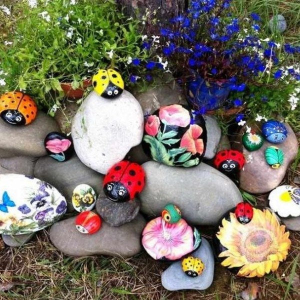 Artistic painted rock garden decorations, perfect for DIY gifts for mom.