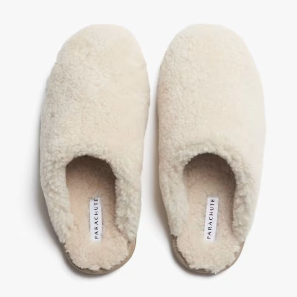 Treat her feet to luxury with the Parachute Shearling Wool Clogs, a comfortable and stylish anniversary gift for your wife.
