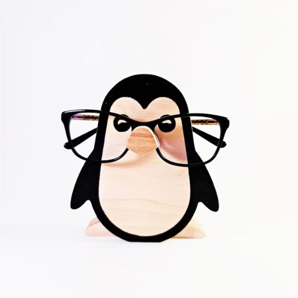 Adorable penguin eyeglass holder, a charming gift for a 60th anniversary.