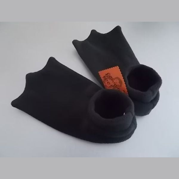 Penguin Feet Slippers are the perfect gift for warm and fuzzy relaxation.