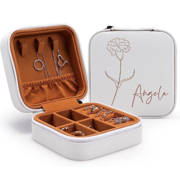 Preserve your treasures in style with the Personalization Lab Custom Leather Jewelry Box for couples.