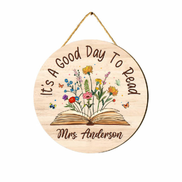 A close-up image of a beautifully crafted Personalized Book Lovers Wood Door Sign, a perfect gift for avid readers, featuring custom text and intricate woodwork, ideal for bookworms