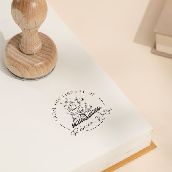 Personalized Book Stamp as a unique and thoughtful gift for book lovers on their 6 month anniversary.