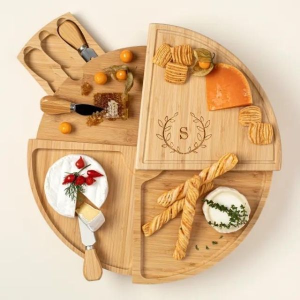 Personalized Compact Swivel Cheese Board is an innovative and stylish choice for 50th anniversary gifts, ideal for hosting.