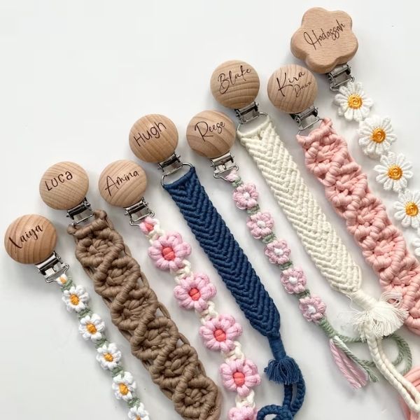 Personalized Engraved Wood Macrame Pacifier Clip combines craftsmanship and personalization in baby shower favors.