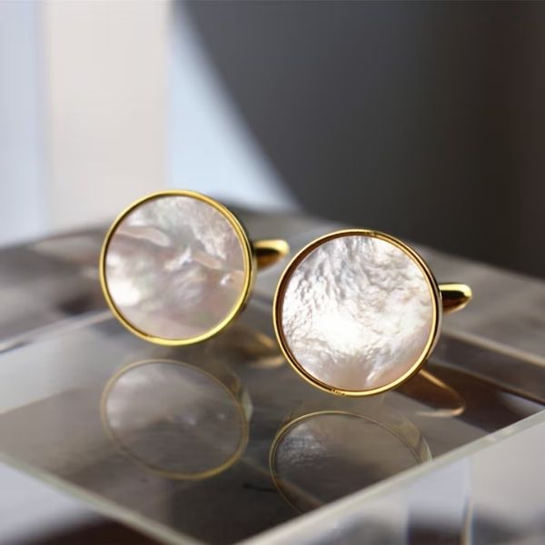 Personalized Gold & Pearl Cufflinks offer a touch of sophistication, a luxurious 50th anniversary gift.