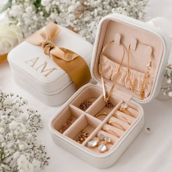 A personalized jewelry box, a perfect gift for boyfriend's mom to keep her cherished pieces organized and safe.
