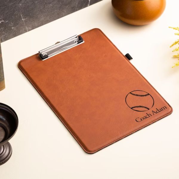 Personalized Leather Clipboard adds a touch of class to game strategies, elevating it to a top choice in baseball coach gifts.