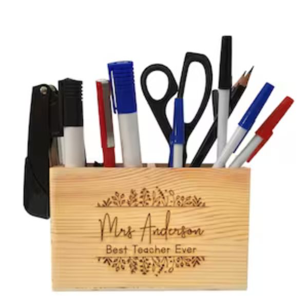 Declutter and personalize your teacher's space with the Teacher Desk Organizer, a practical end-of-year gift.