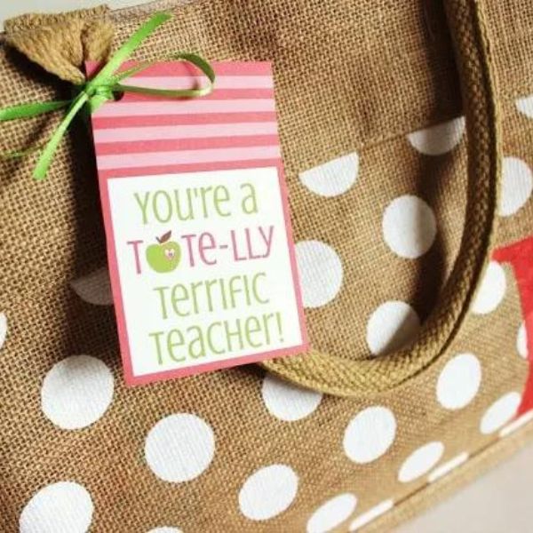 Elevate your teacher appreciation game with Personalized Tote Bags adorned with a printable tag