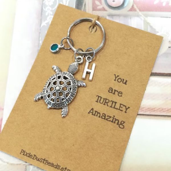 Personalized Turtle Keychain with initial charm, perfect for turtle gifts enthusiasts.