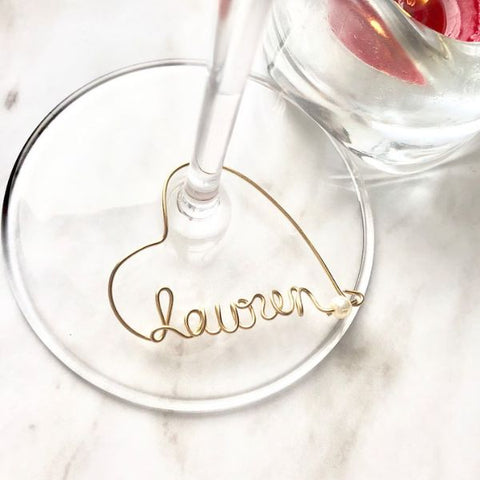 Custom wine charms, a charming gift for wine-loving guests.