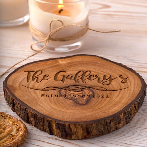 A charming image of personalized wood coasters for friends, a timeless and practical anniversary gift