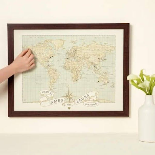 Personalized Anniversary Pushpin World Maps track a couple's adventures, a thoughtful gift for 50th anniversaries.