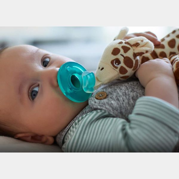 Keep pacifiers close and secure with the Philips AVENT Soothie Snuggle Pacifier Holder, a cozy and convenient accessory.