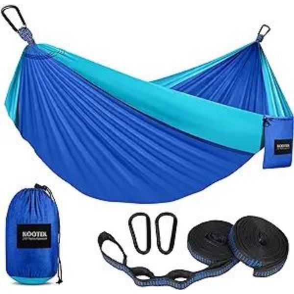Relax in nature with the Portable Wilderness Hammock - an outdoor enthusiast's must-have from Father's Day gift ideas from a daughter.