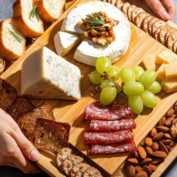 Elevate your son's gatherings with the Premium Cheese and Charcuterie Board, redefining Gifts for Son with moments of culinary surprise.